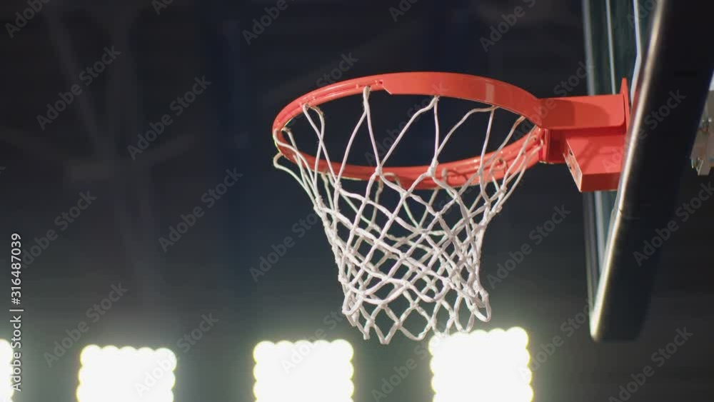 Professional Basketball Player Making Slam Dunk - 4k slow motion crane shot Professional Basketball Player Making Slam Dunk - 4k slow motion crane shot