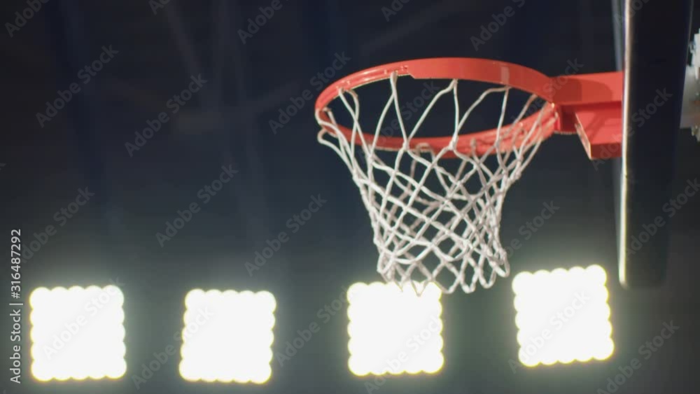 Professional Basketball Player Making Slam Dunk - 4k slow motion crane shot Professional Basketball Player Making Slam Dunk - 4k slow motion crane shot