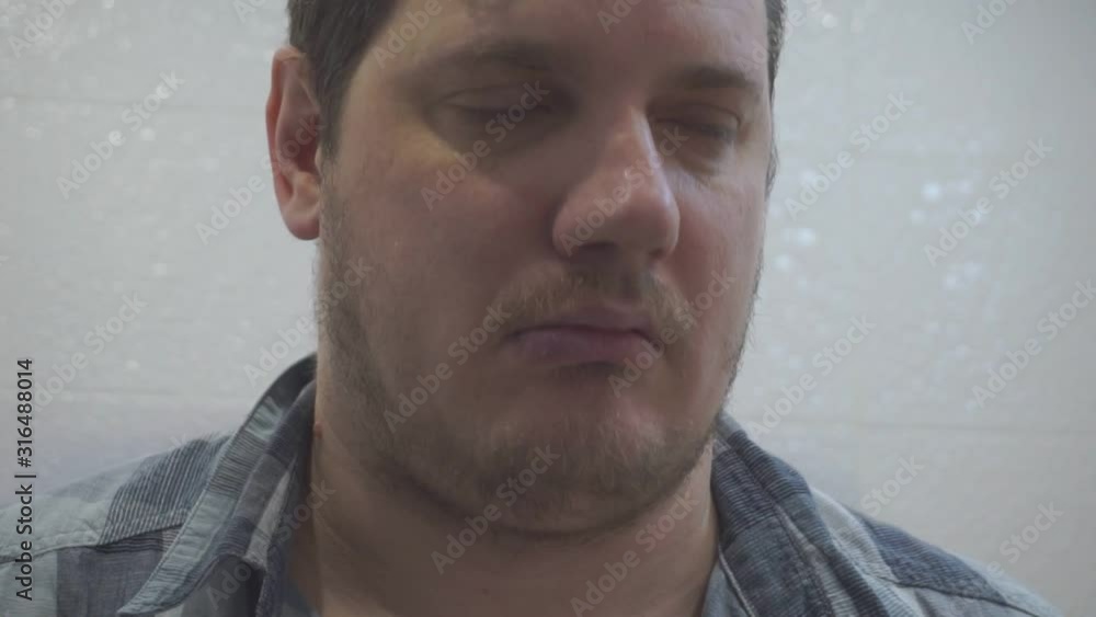 portrait of a middle-aged man who hiccups portrait of a middle-aged man who hiccups