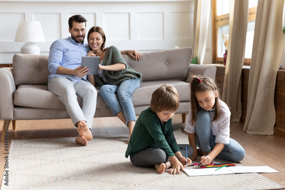 Fototapeta premium Happy family with kids enjoy weekend at home