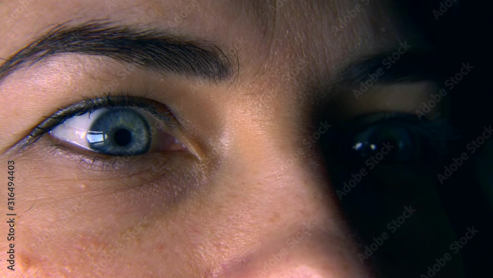 Close-up. Macro Blue Female Human Eye. Pupil Cornea Iris Eyeball Eyelashes. Blink Open Closed. 30p Slow motion Close-up. Macro Blue Female Human Eye. Pupil Cornea Iris Eyeball Eyelashes. Blink Open Closed. 30p Slow motion