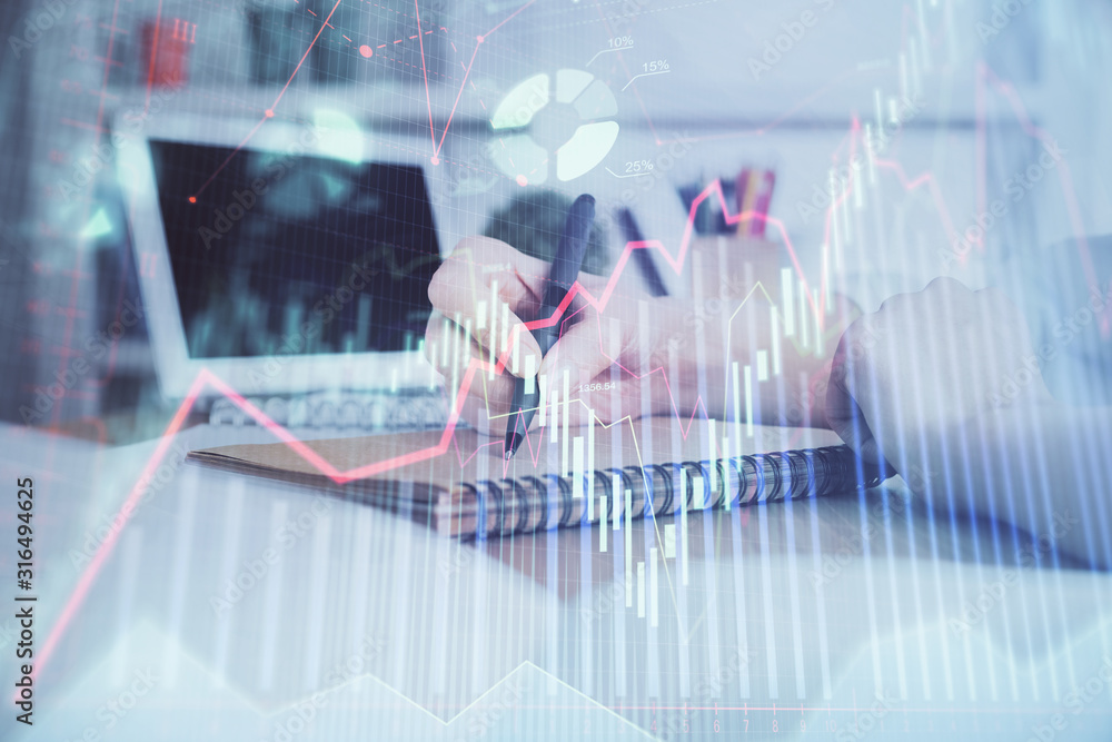 Financial graph displayed on woman's hand taking notes background. Concept of research. Double exposure Financial graph displayed on woman's hand taking notes background. Concept of research. Double exposure