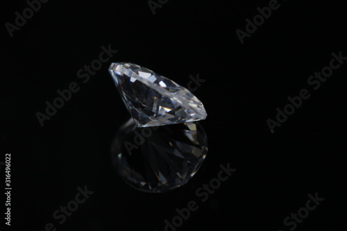 Briliant sparkling clear diamond  close up shoot on isolated background