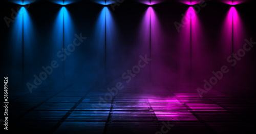 Dark background of the street  thick fog  spotlight  blue and red neon. Abstract background with neon lights  night view.