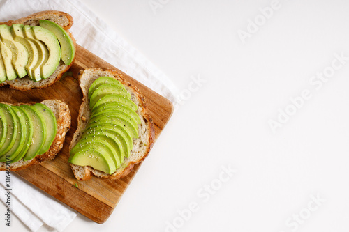toast with sliced avocado topping