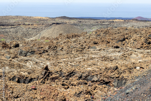 View at multi colored volcanic landscape in Timanfaya Nationalpark on canary island Lanzarote