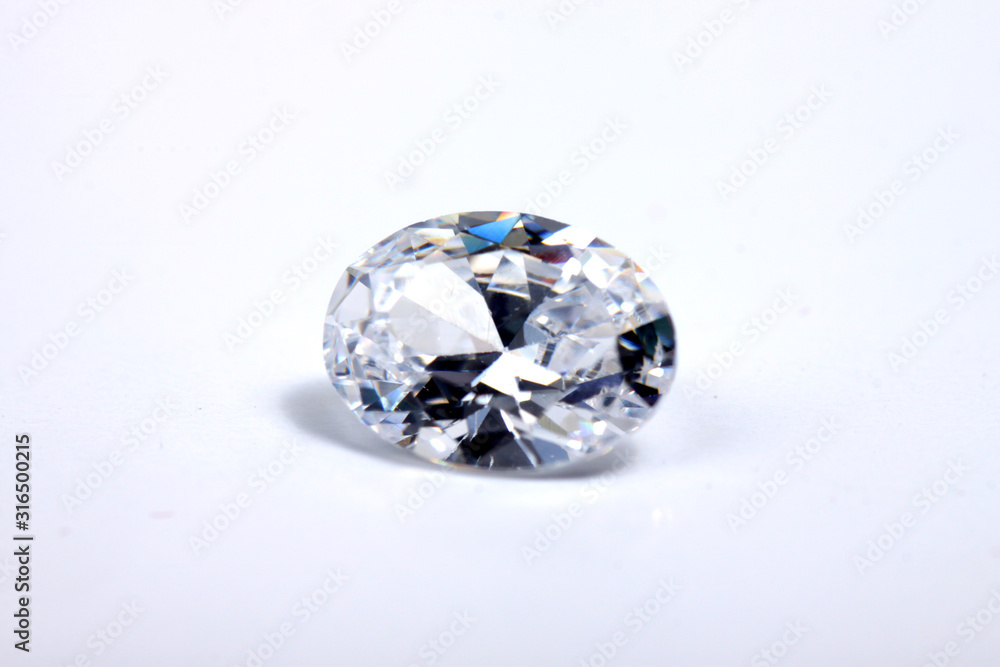 Briliant sparkling clear diamond, close up shoot on isolated background Briliant sparkling clear diamond, close up shoot on isolated background