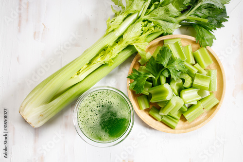 fresh celery and celery green juice photo