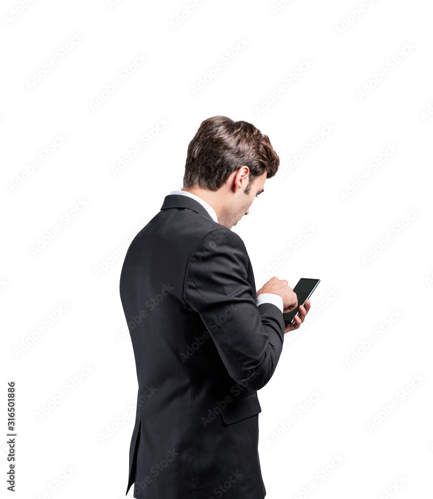 Side view of businessman using smartphone Side view of businessman using smartphone