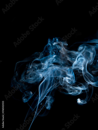 smoke texture  on black background © kanchana
