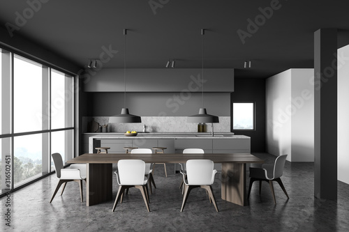 Gray and white kitchen interior with table