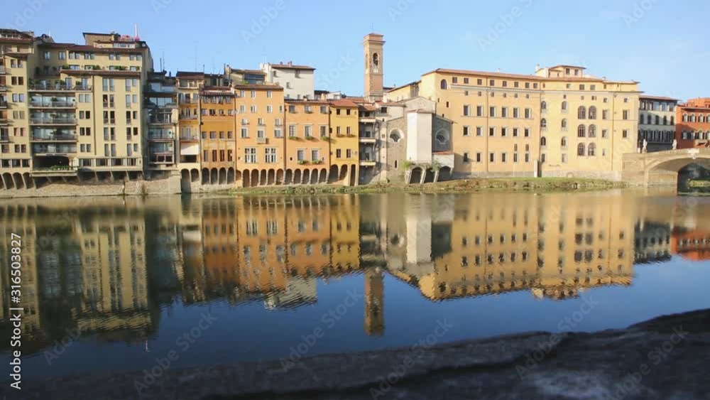 Reflection of houses in the city of Florence in the river Arno Reflection of houses in the city of Florence in the river Arno