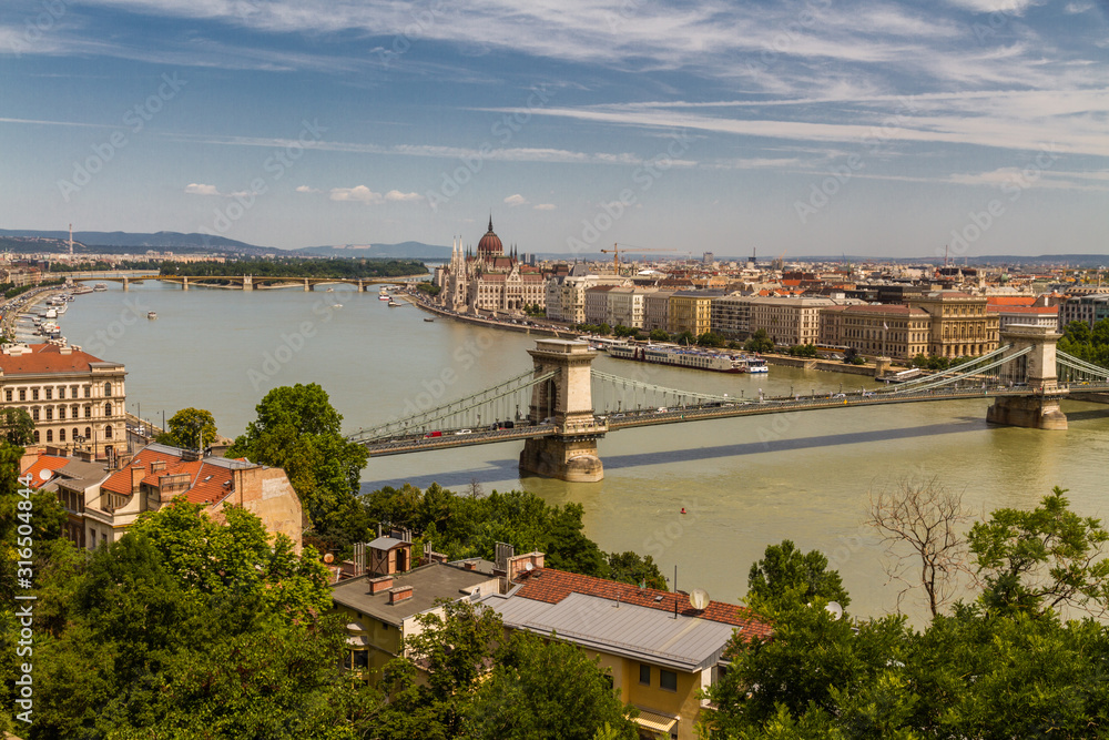 River Danube in Budapest Hungary, parliament and the Chain Bridge.