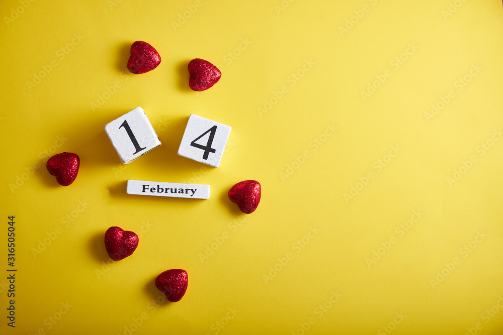 Calendar with the date of February 14, hearts on a yellow background, a place for an inscription Calendar with the date of February 14, hearts on a yellow background, a place for an inscription