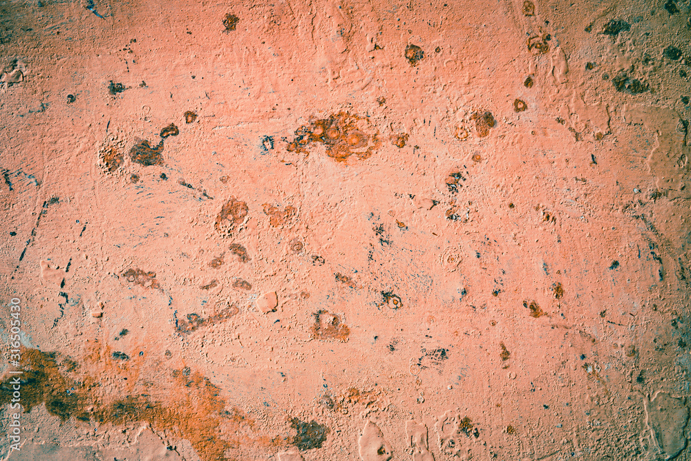 Old rough wall texture for background. Wallpaper with vintage or retro colors. Dark orange background Old rough wall texture for background. Wallpaper with vintage or retro colors. Dark orange background