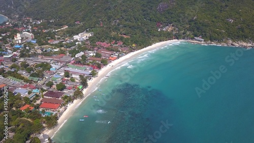 Aerial  Shoreline along the Haad Rin sand beach  koh Phangan island  Thailand