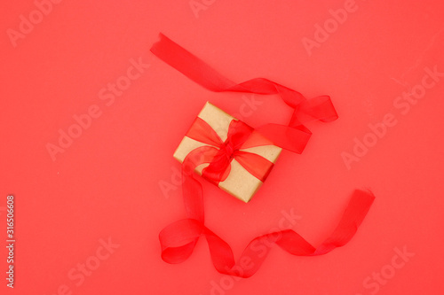 Romantic gift box with red ribbon for Valentine's day 