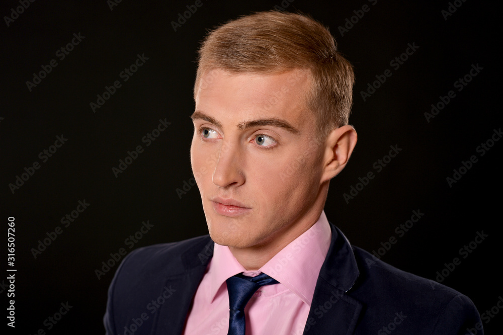 Portrait of young businessman posing in studio Portrait of young businessman posing in studio