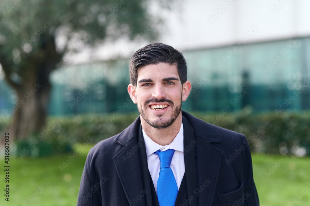 portrait of a young and successful businessman portrait of a young and successful businessman