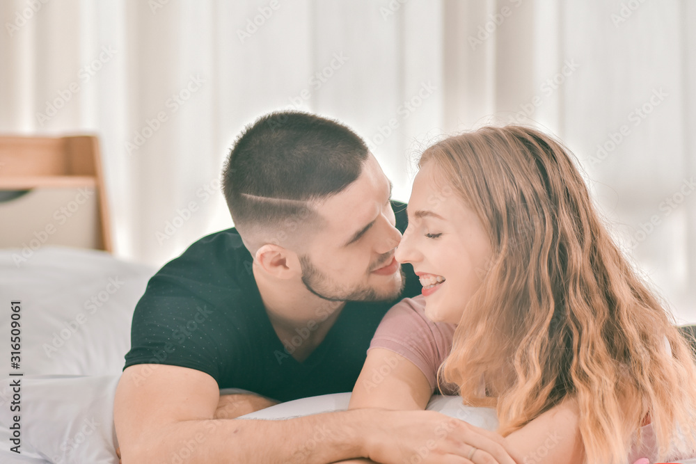 Close up couple sweet love in bedroom morning in Valentine's day Close up couple sweet love in bedroom morning in Valentine's day