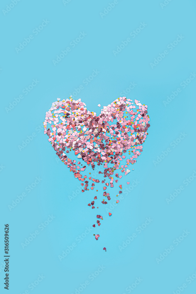 abstract image of a heart made of sparkles crumbles into fragments. concept of disappearing feelings abstract image of a heart made of sparkles crumbles into fragments. concept of disappearing feelings