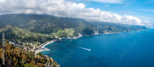 Panoramic view at Cinque Terre coastal area from Mesco Cape. Monterosso al Mare village is at left. Liguria region in Italy.
