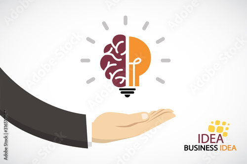 Business hand and creative light bulb.