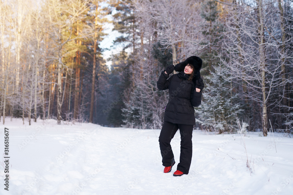woman in winter forest