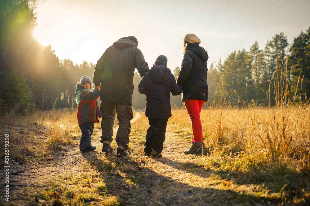 happy family walking on country road happy family walking on country road