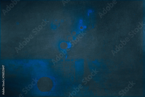 Dark grunge texture with blue spots. Backgrounds.