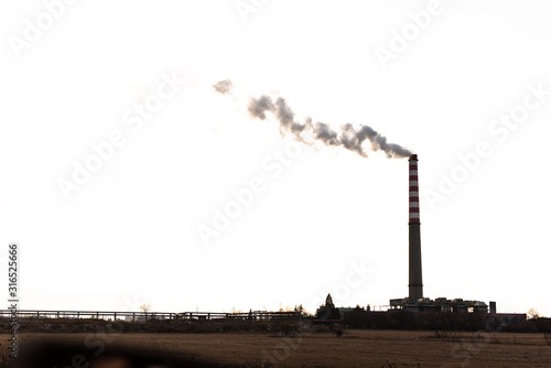 Dirty smoke on the white background, ecology problems industrial workers heating burning city life nature danger