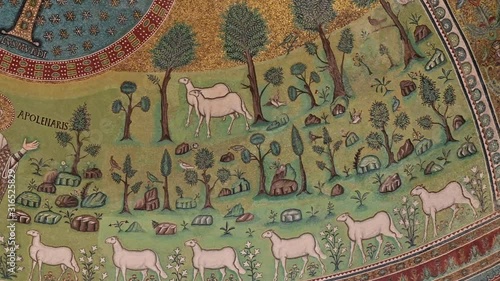 Ravenna, Italy, December 2019. Footage on detail of Jesus from the basilica of Apollinare in classe. Close up shot of the setting around San Apollinare.