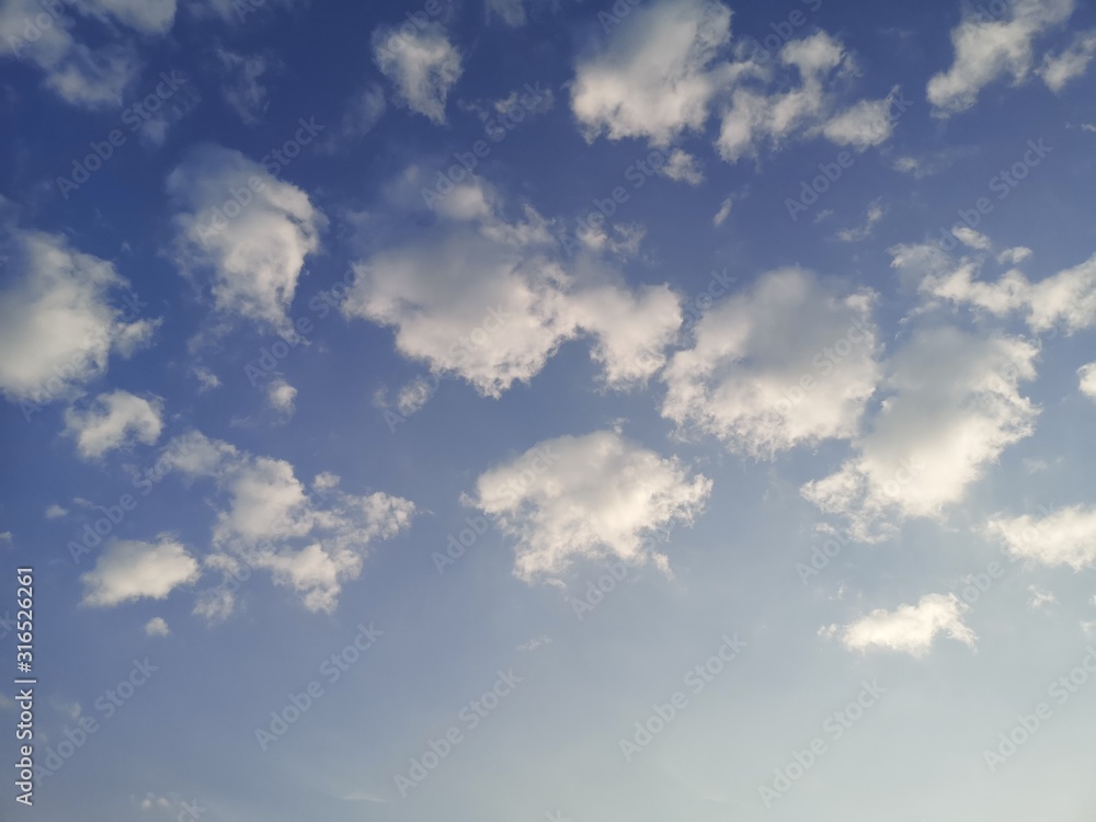 Altostratus, white clouds in the blue sky natural background beautiful nature environment
