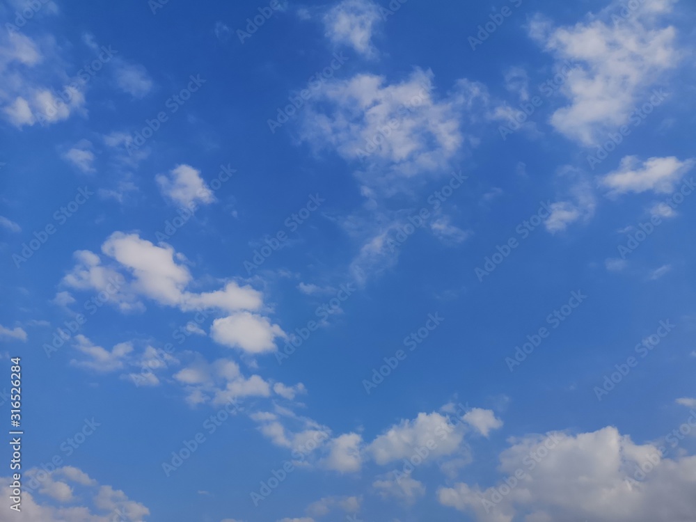 Cirrus, white clouds in the blue sky natural background beautiful nature environment Cirrus, white clouds in the blue sky natural background beautiful nature environment