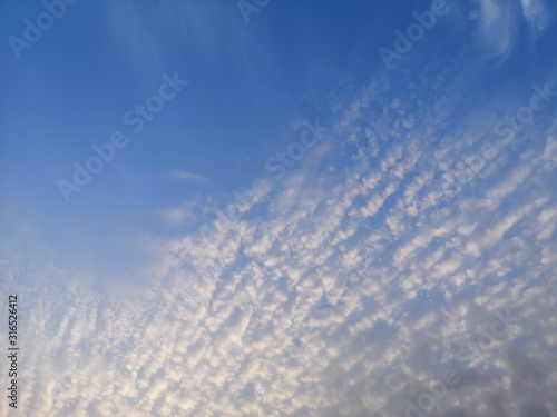 Cirrus, white clouds in the blue sky natural background beautiful nature environment