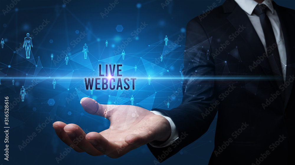 Fototapeta premium Elegant hand holding LIVE WEBCAST inscription, social networking concept