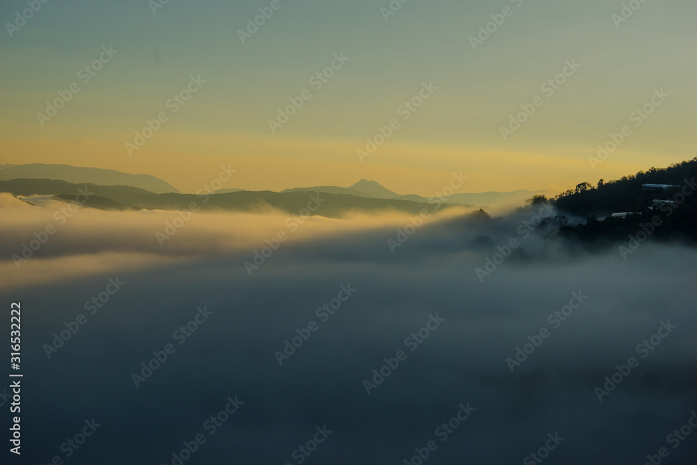 Fototapeta premium the hill in mist and sunlight