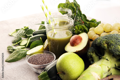 Healthy green smoothie and ingredients - detox and diet for health