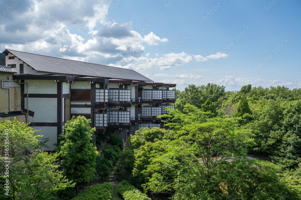 Traditional Japanese Style Buildings in the mountains in summer against blue sky