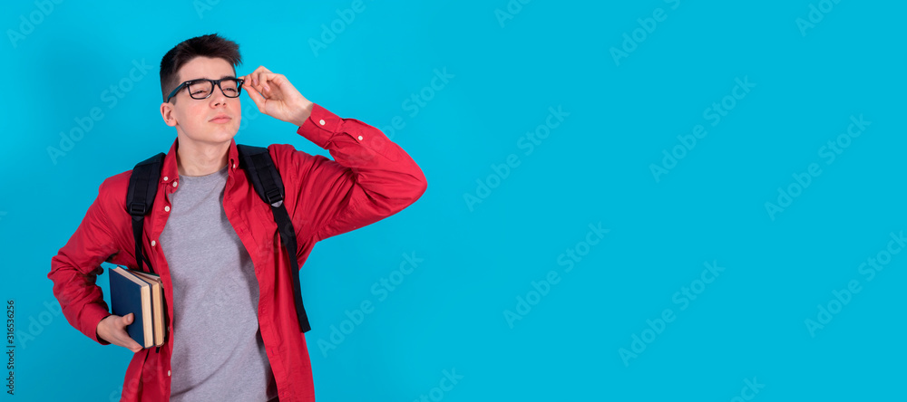 Isolated student with backpack books and glasses in color background ...