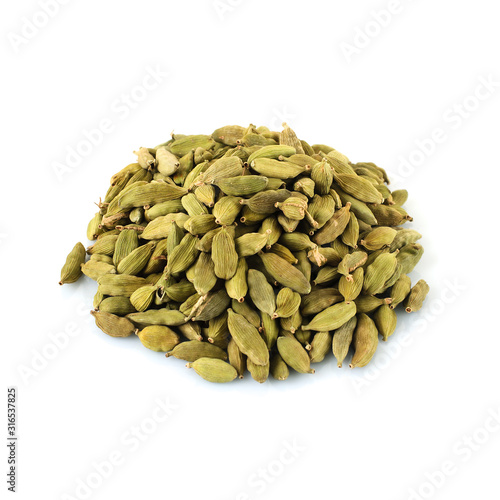 green cardamom on a white background