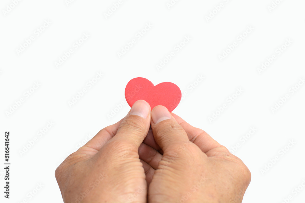 Red heart on hand isolated on white background, valentine concept. Red heart on hand isolated on white background, valentine concept.