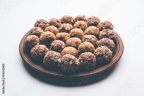 Group of Dink, Gond  , Aliv, Halim laddu, Laddoo, Ladu, Ladoo Made using Garden cress Seed and edible gum, sweet food photo