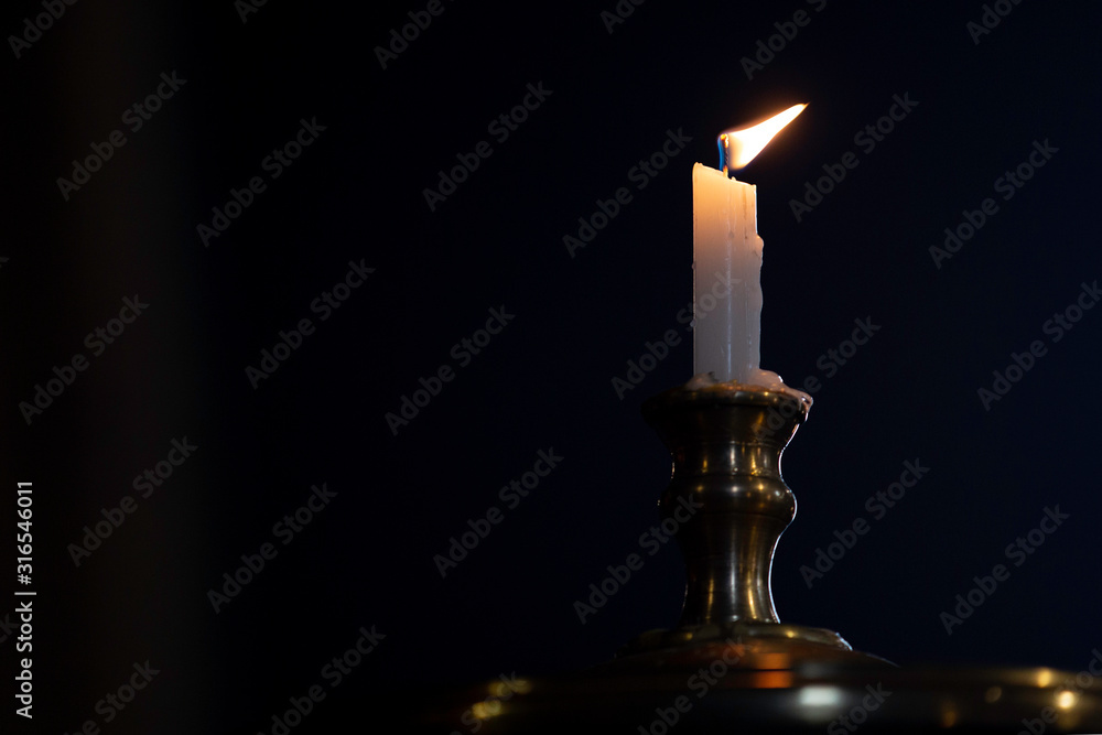 candle on black background candle on black background