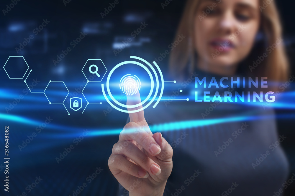 Business, Technology, Internet and network concept. Young businessman working on a virtual screen of the future and sees the inscription: Machine learning Business, Technology, Internet and network concept. Young businessman working on a virtual screen of the future and sees the inscription: Machine learning