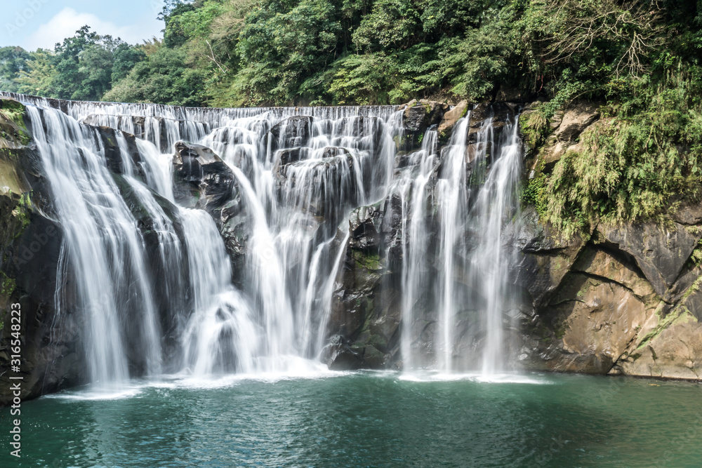 Shihfen Waterfall, Fifteen meters tall and 30 meters wide, It is the largest curtain-type waterfall in Taiwan Shihfen Waterfall, Fifteen meters tall and 30 meters wide, It is the largest curtain-type waterfall in Taiwan