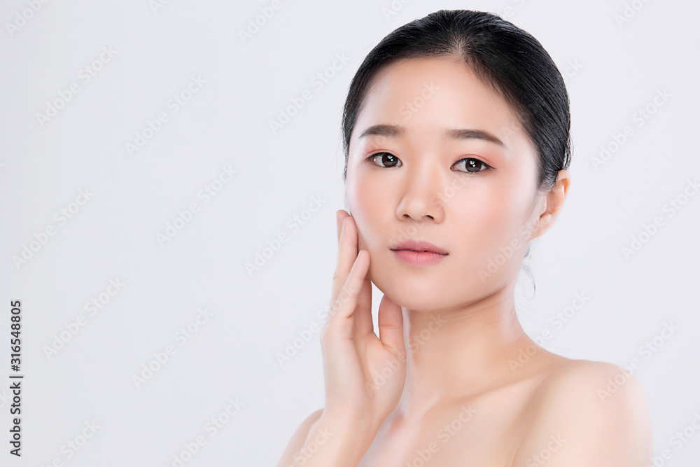 Portrait beautiful young asian woman clean fresh bare skin concept. Asian girl beauty face skincare and health wellness, Facial treatment, Perfect skin, Natural make up, on white background Portrait beautiful young asian woman clean fresh bare skin concept. Asian girl beauty face skincare and health wellness, Facial treatment, Perfect skin, Natural make up, on white background
