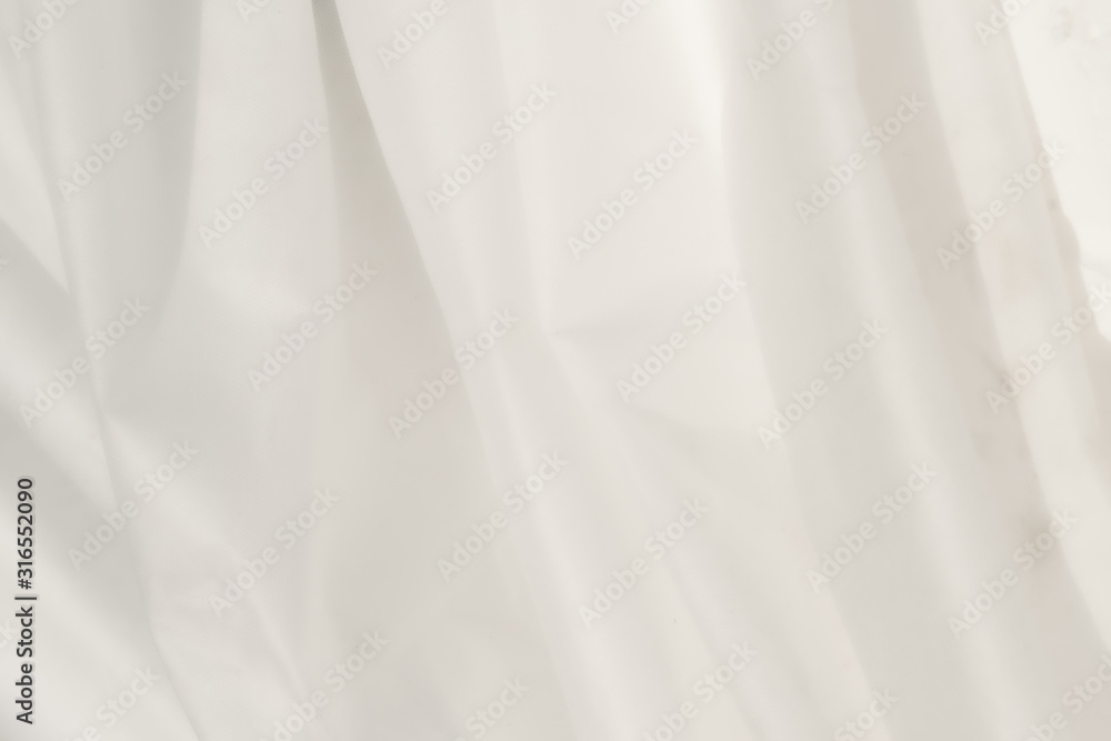 White, delicate background. Fabric abstraction