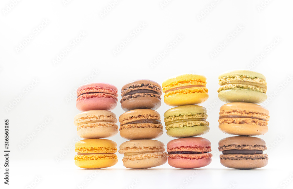 Sweet and colourful french macaroons or macaron on background, Dessert. Sweet and colourful french macaroons or macaron on background, Dessert.