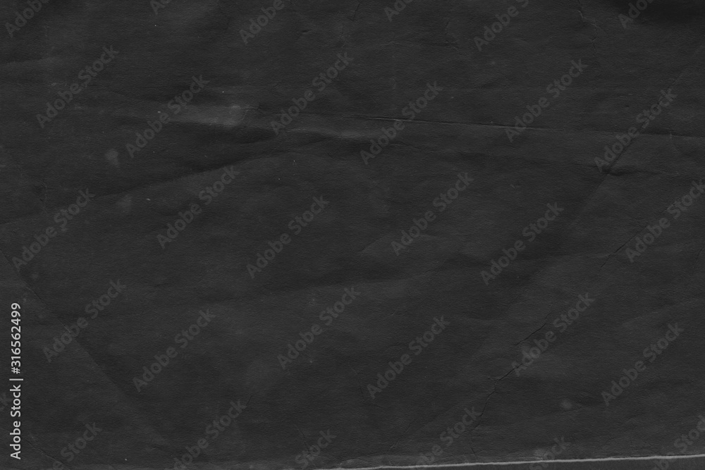 Cardboard black abstract texture close-up. Dark old paper background. Grunge concrete wall. Vintage blank wallpaper. Cardboard black abstract texture close-up. Dark old paper background. Grunge concrete wall. Vintage blank wallpaper.